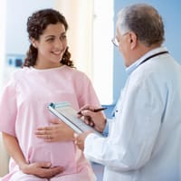 obstetrician pregnant woman
